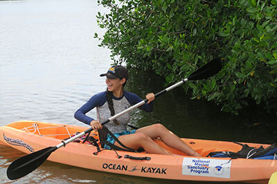 a woman kayaking