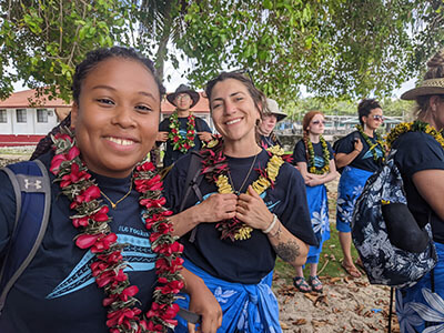 several foster scholars wearing lei