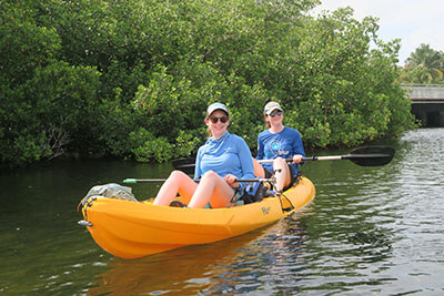 two women sitiing in a kayak