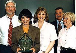 A picture of Nancy Foster getting an award