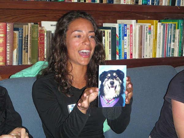 Tammy Silva holding a picture of a dog