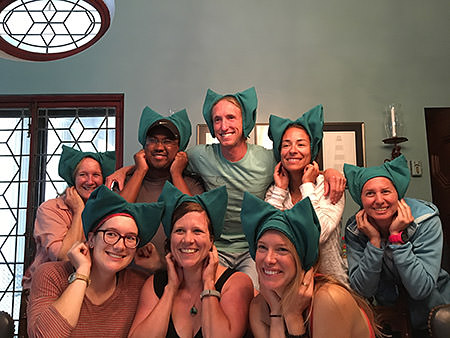 Dr. Nancy Foster Scholars wearing napkin ears on their heads